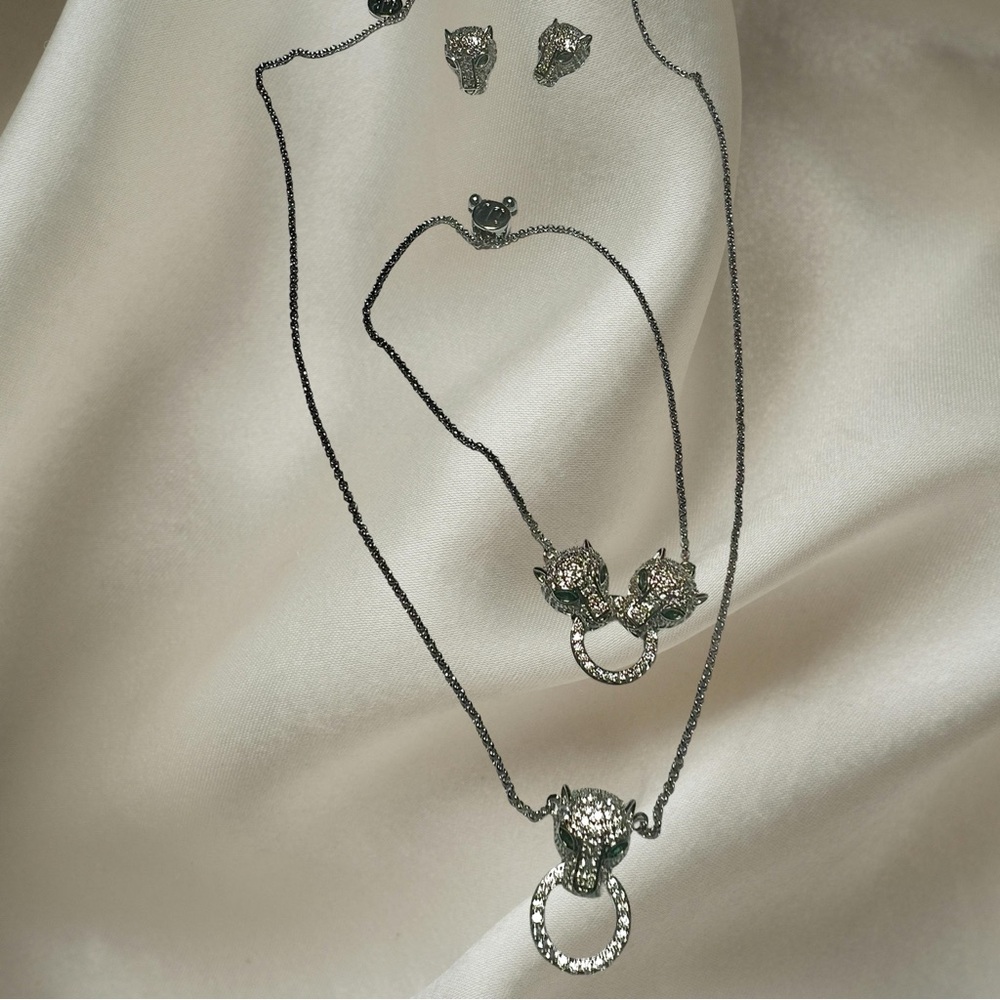 Silver tone Rhinestone Panther Head Suite.